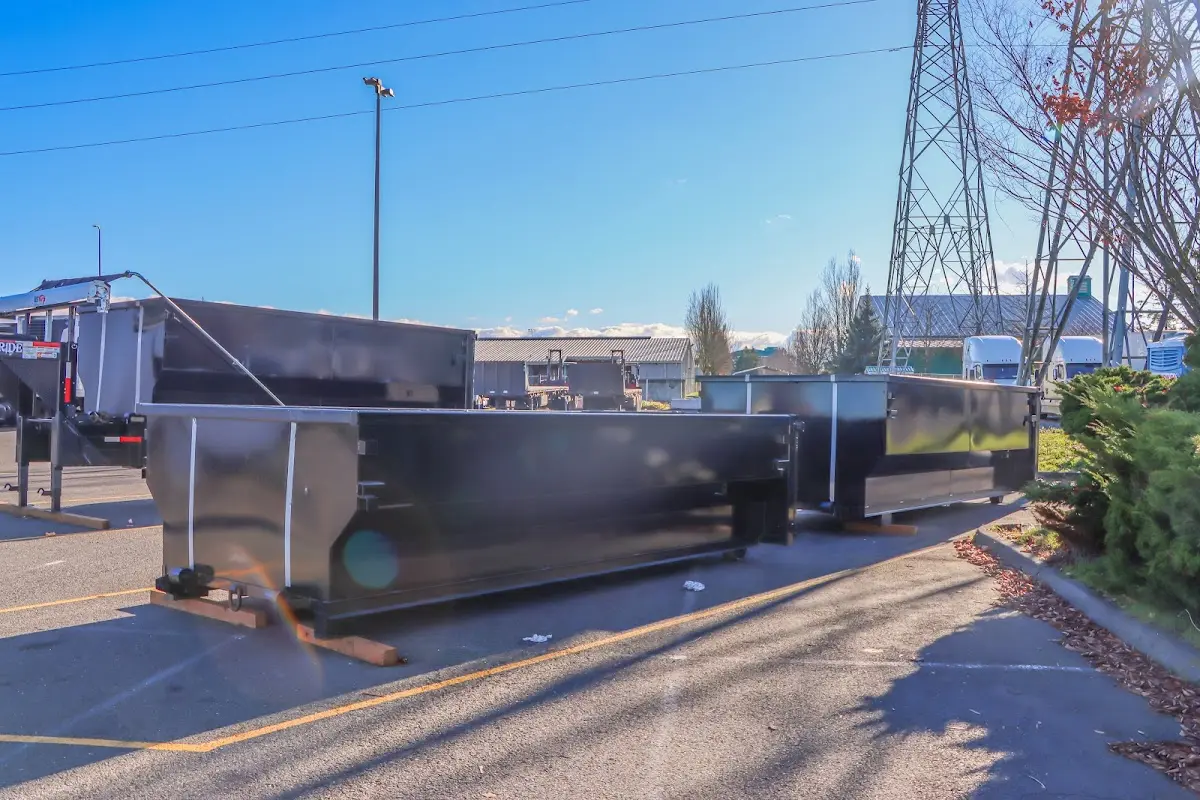 Roll-off dumpster ready for waste disposal at job site for Construction Dumpster Rental in Wakefield